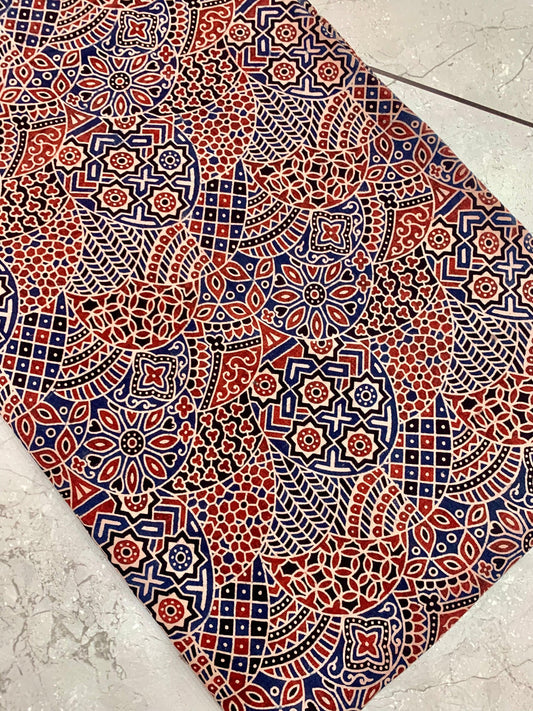 Maroon Ajrakh handblock printed pure cotton fabric wholesale with traditional jaal pattern, artisan-made by Fabtexs.