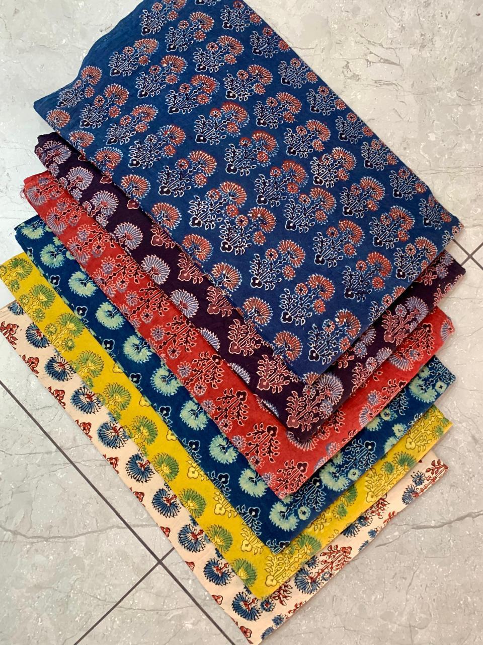 Multi-pattern Ajrakh printed pure cotton wholesale fabric featuring classic handcrafted Rajasthan designs by Fabtexs.