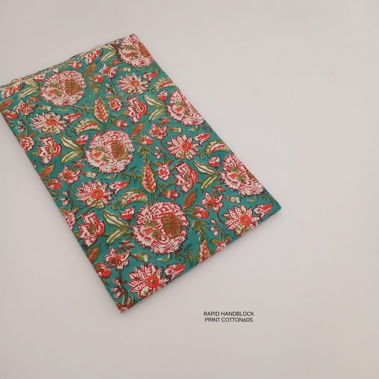 Green peach floral jaal Sanganeri handblock printed cotton fabric wholesale by Fabtexs