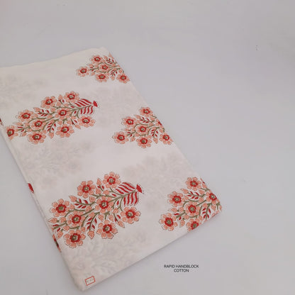 Artisan-made Jaipur Sanganeri Handblock Cotton Fabric in white with peach floral butta, ideal for wholesale and B2B bulk orders.