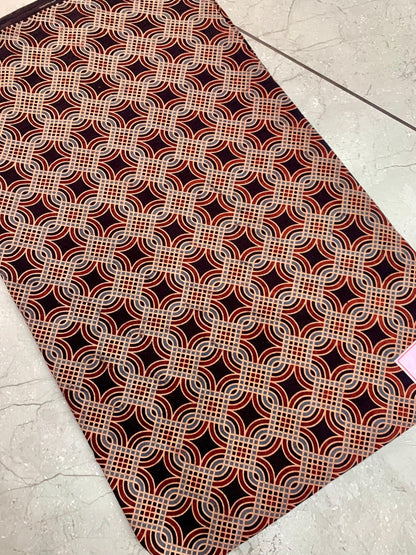 Black Ajrakh handblock printed pure cotton wholesale fabric with bold artisan motifs and traditional dye tones.