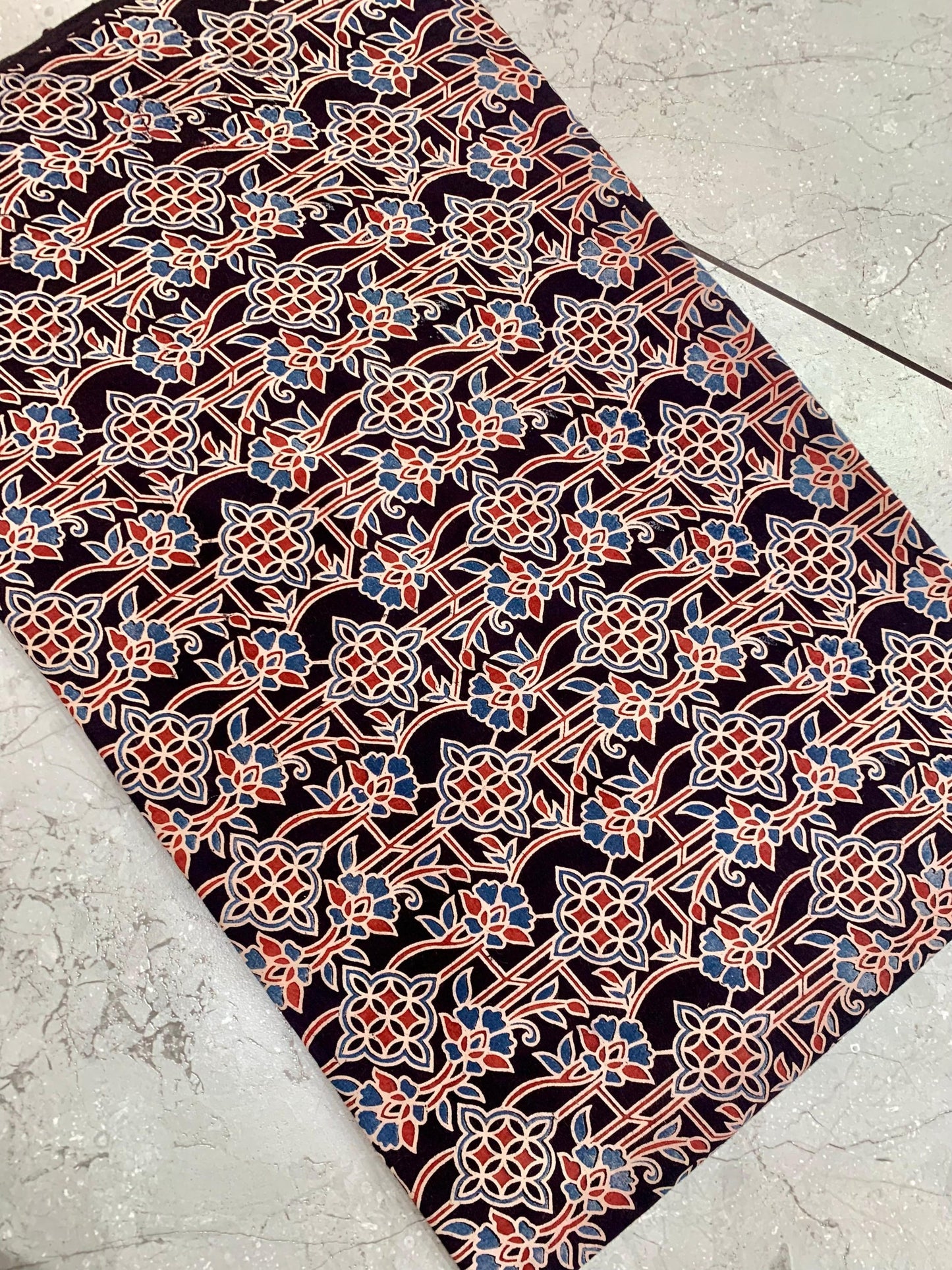 Black Ajrakh floral handblock printed pure cotton fabric wholesale with natural-dye impressions by Fabtexs.