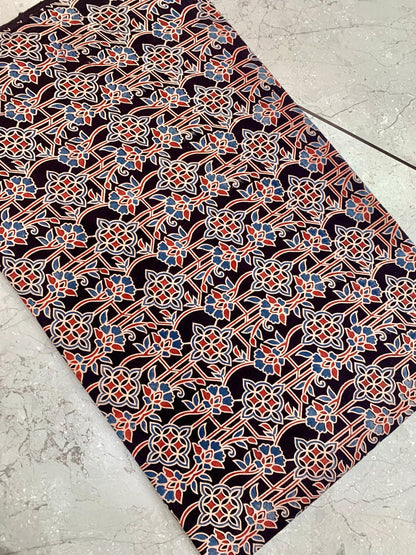 Black Ajrakh floral handblock printed pure cotton fabric wholesale with natural-dye impressions by Fabtexs.