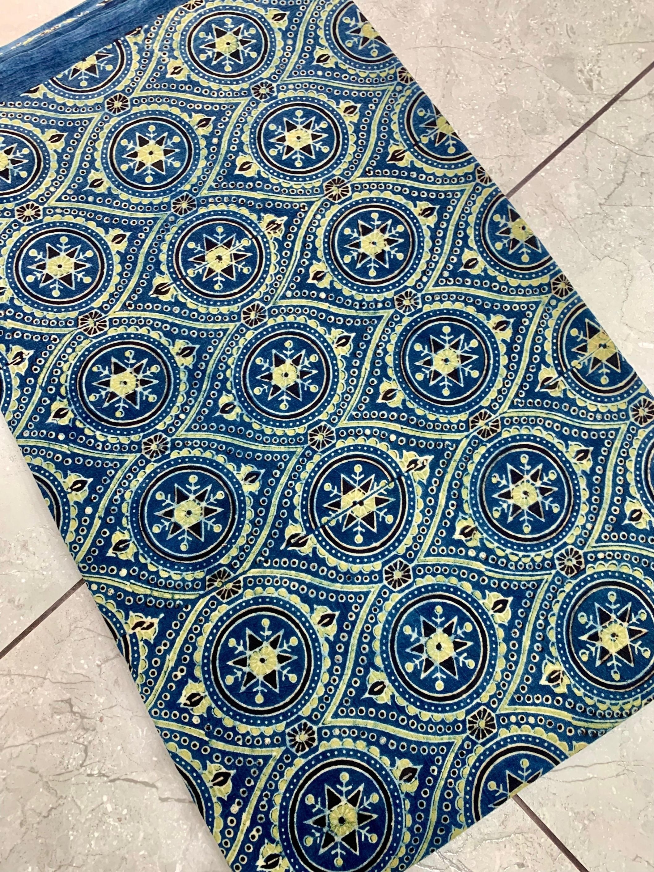 Blue Ajrakh handblock printed cotton fabric wholesale with intricate artisan motifs perfect for boutiques and designers.