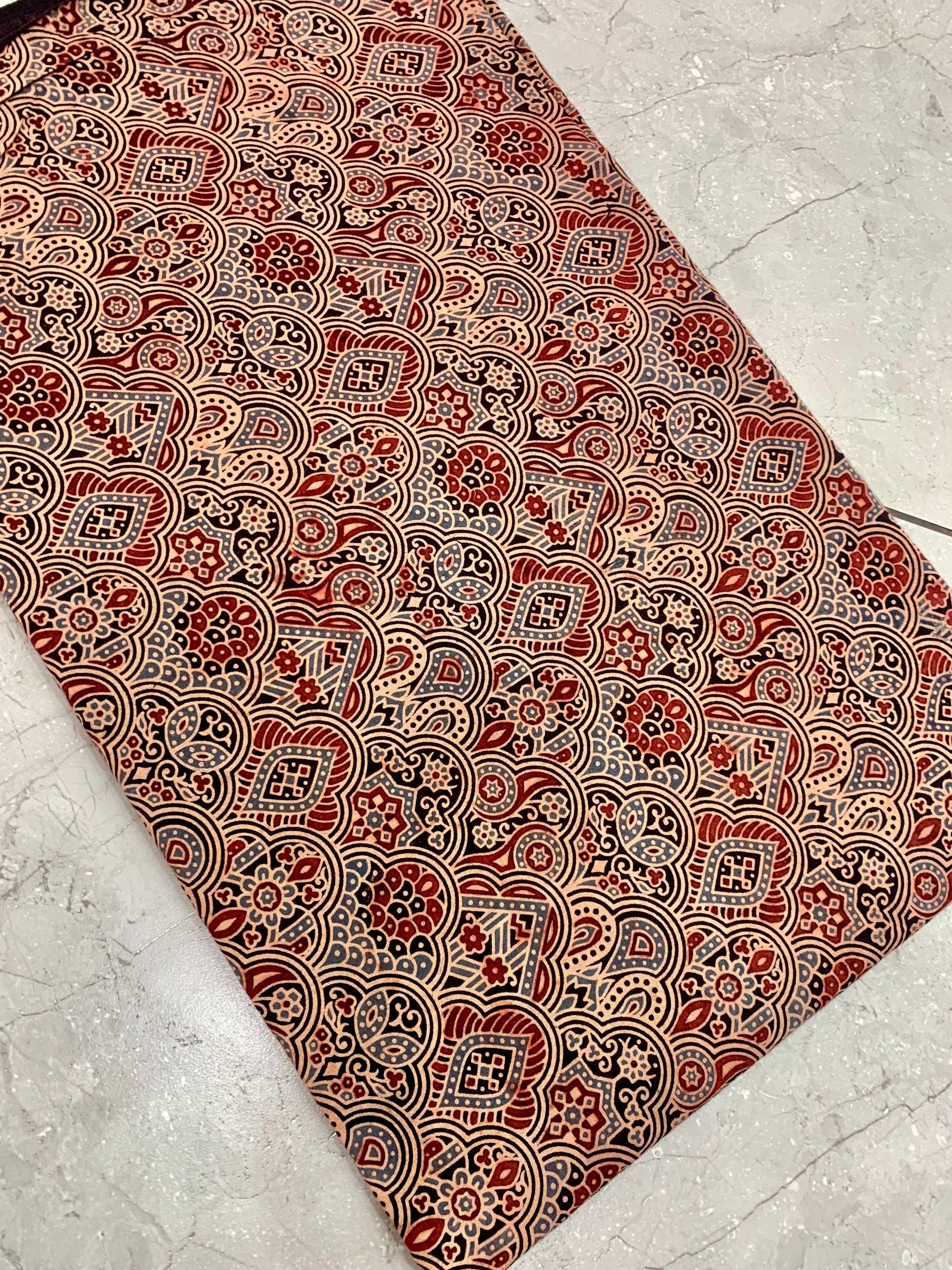 Brown Ajrakh handblock printed pure cotton wholesale fabric showcasing geometric artisan designs by Fabtexs.
