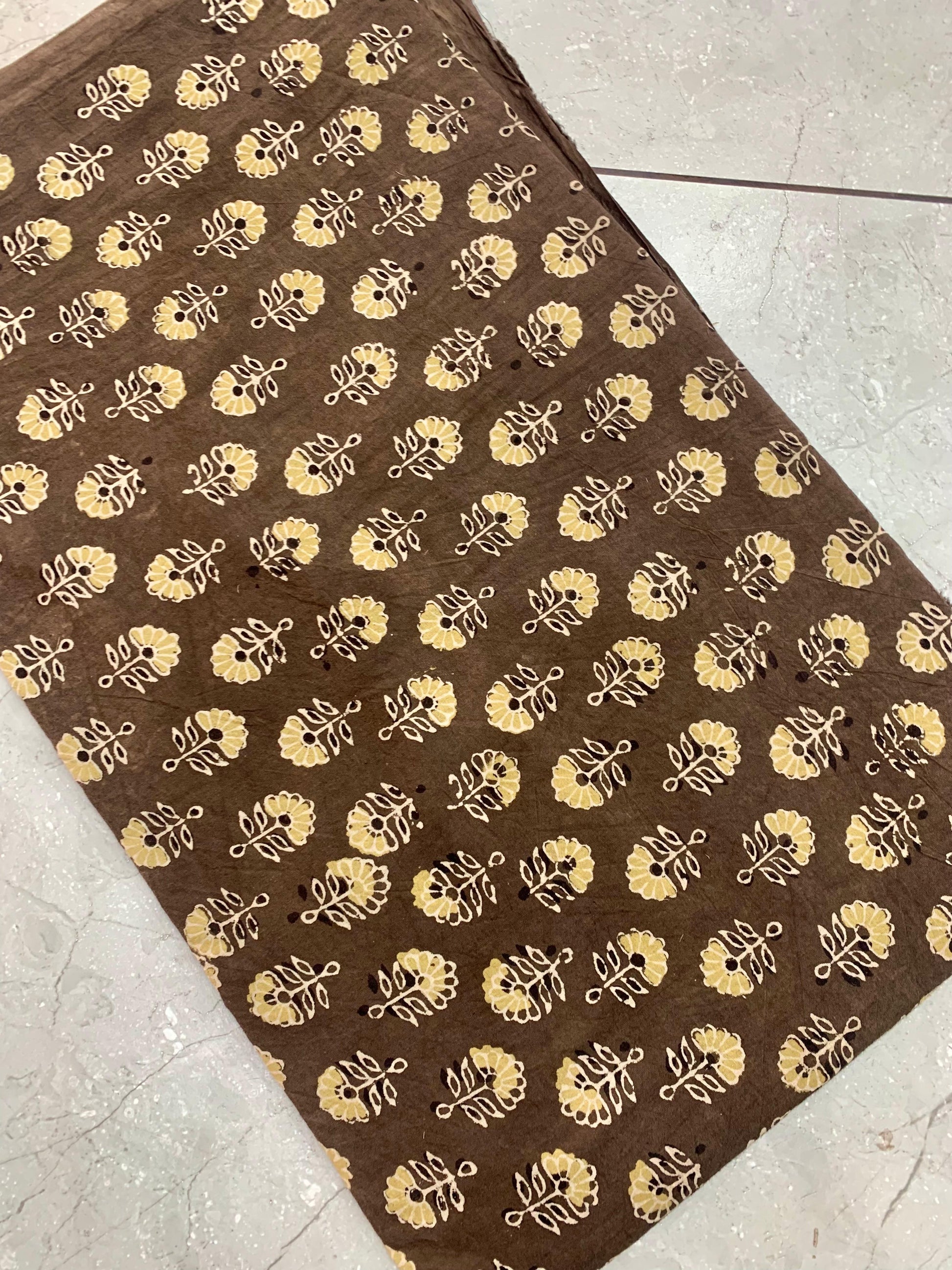 Brown Ajrakh floral pure cotton handblock printed fabric wholesale inspired by traditional Kutch artistry by Fabtexs.