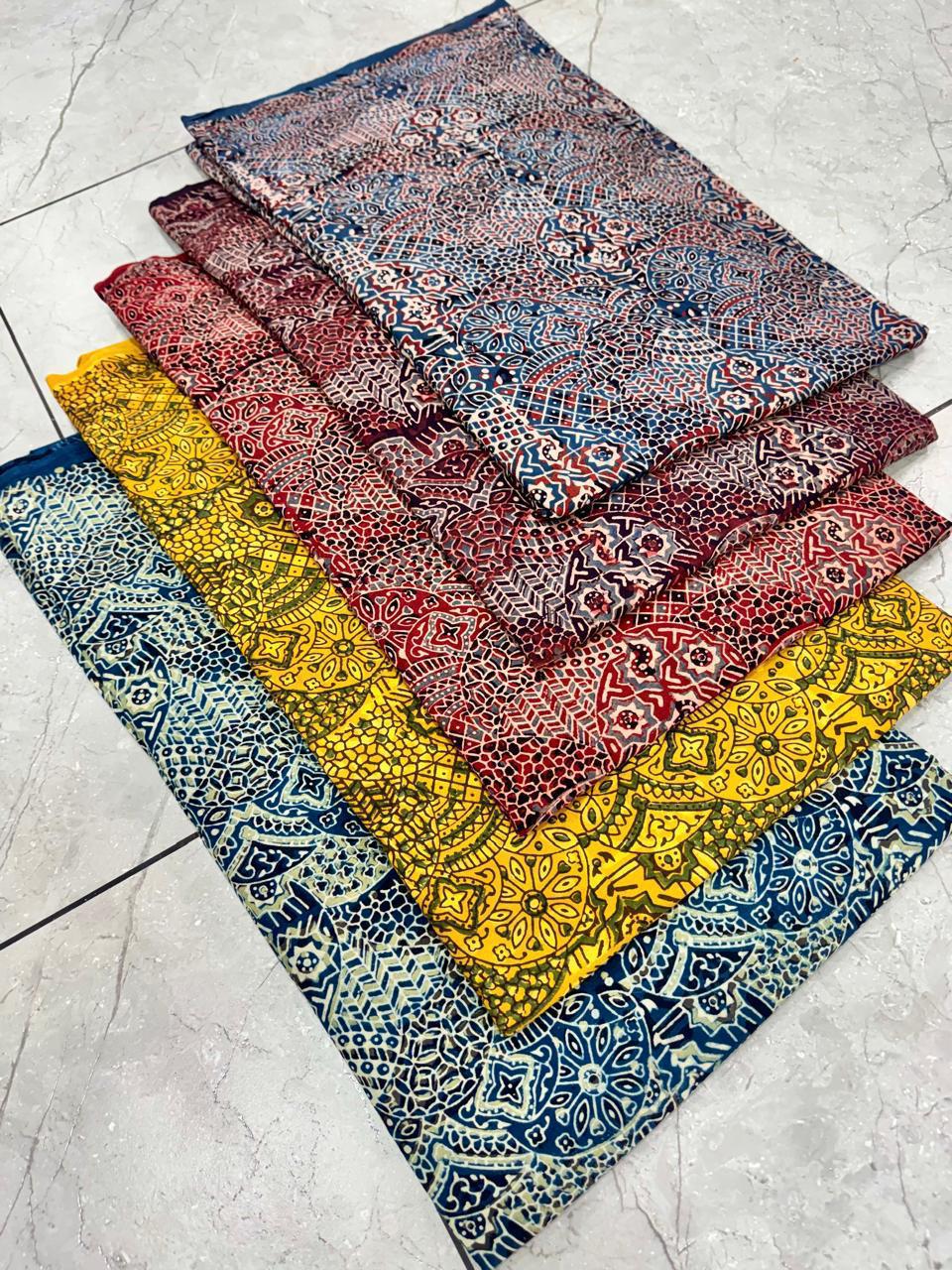 Floral jaal Ajrakh handblock printed pure cotton wholesale fabric featuring intricate artisan motifs by Fabtexs.