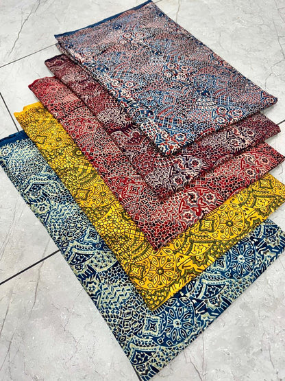 Floral jaal Ajrakh handblock printed pure cotton wholesale fabric featuring intricate artisan motifs by Fabtexs.