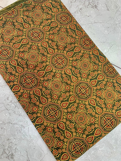 Green Ajrakh pure cotton handblock printed wholesale fabric with earthy geometric design work by Fabtexs.
