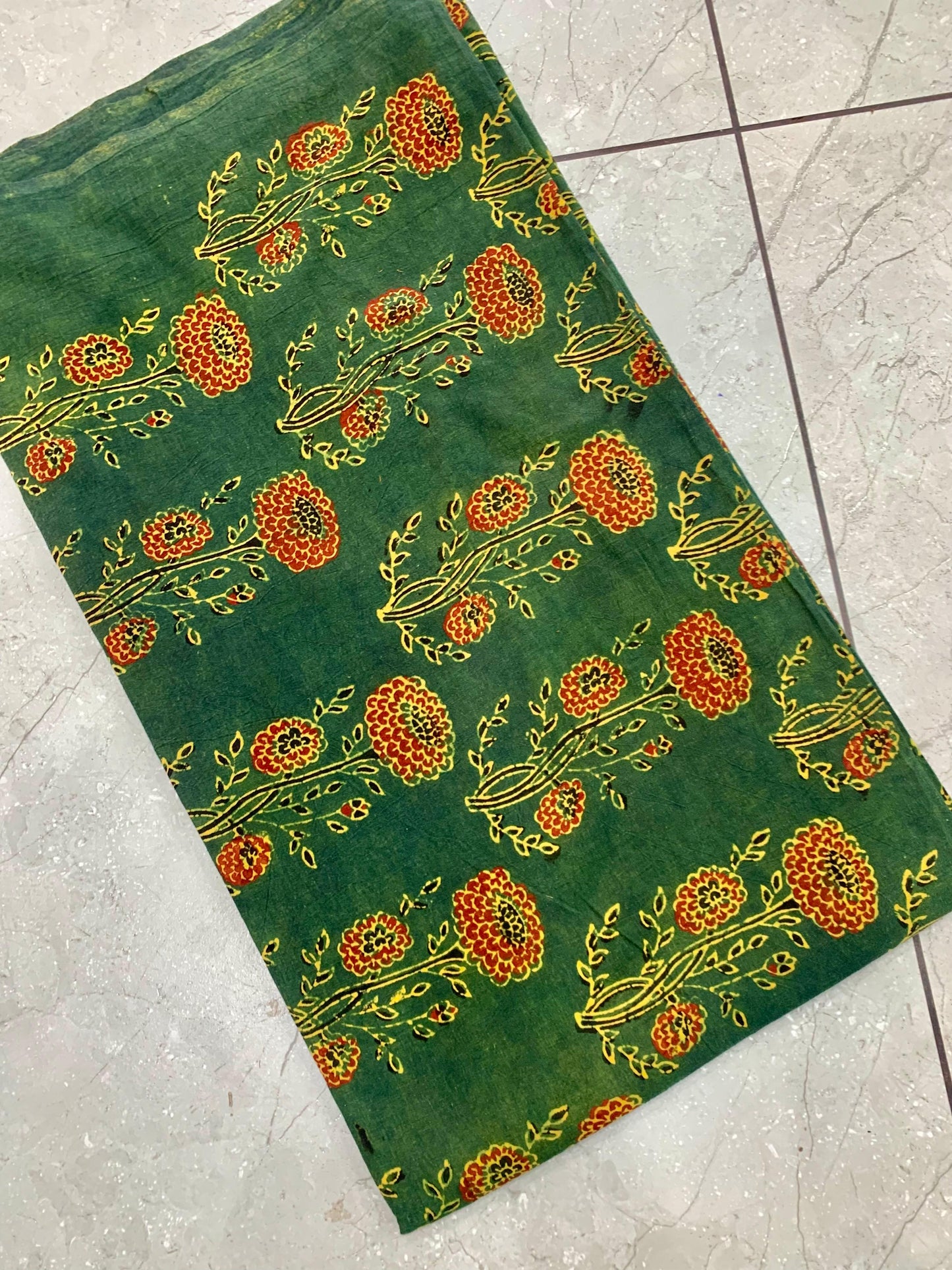 Green Ajrakh floral butta pure cotton handblock printed wholesale fabric in artisanal tones by Fabtexs.