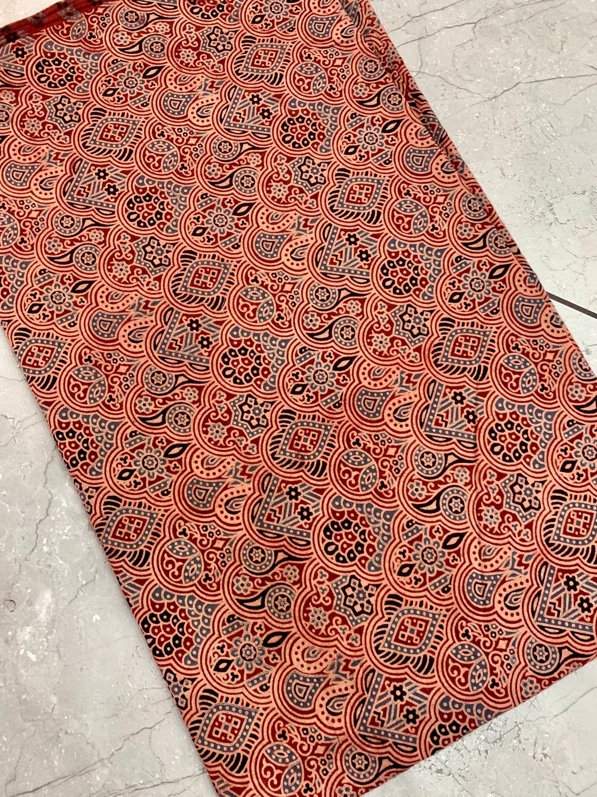 Maroon Ajrakh pure cotton wholesale fabric crafted using natural dyes and traditional handblock techniques.