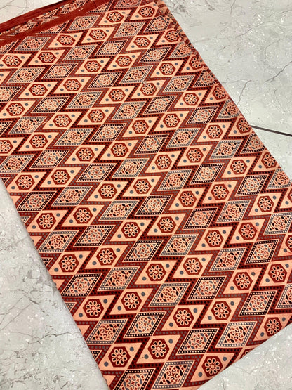 Maroon Ajrakh handblock printed pure cotton wholesale fabric with bold geometrical motifs by Fabtexs.