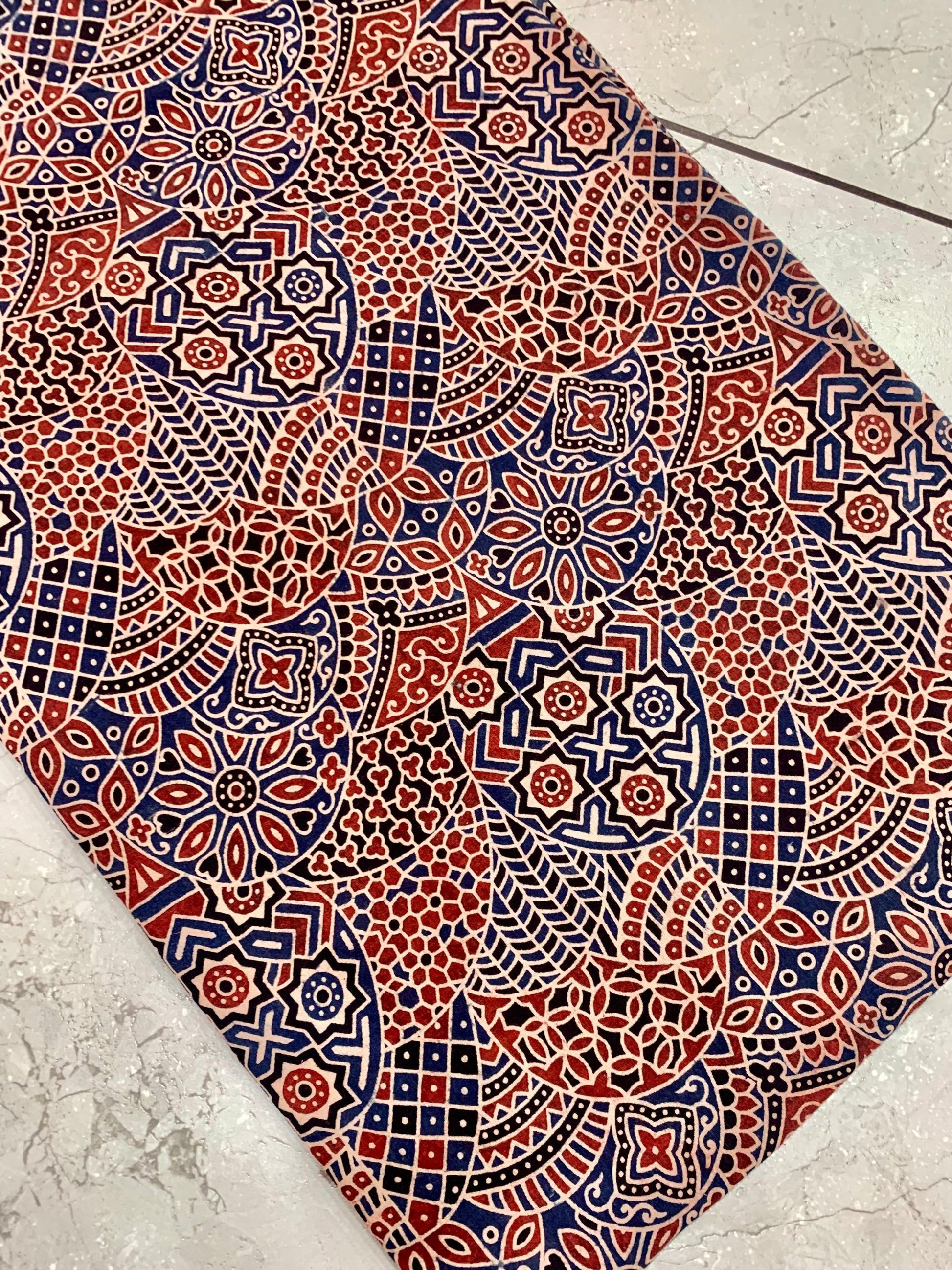 Maroon Ajrakh handblock printed pure cotton fabric wholesale with traditional jaal pattern, artisan-made by Fabtexs.