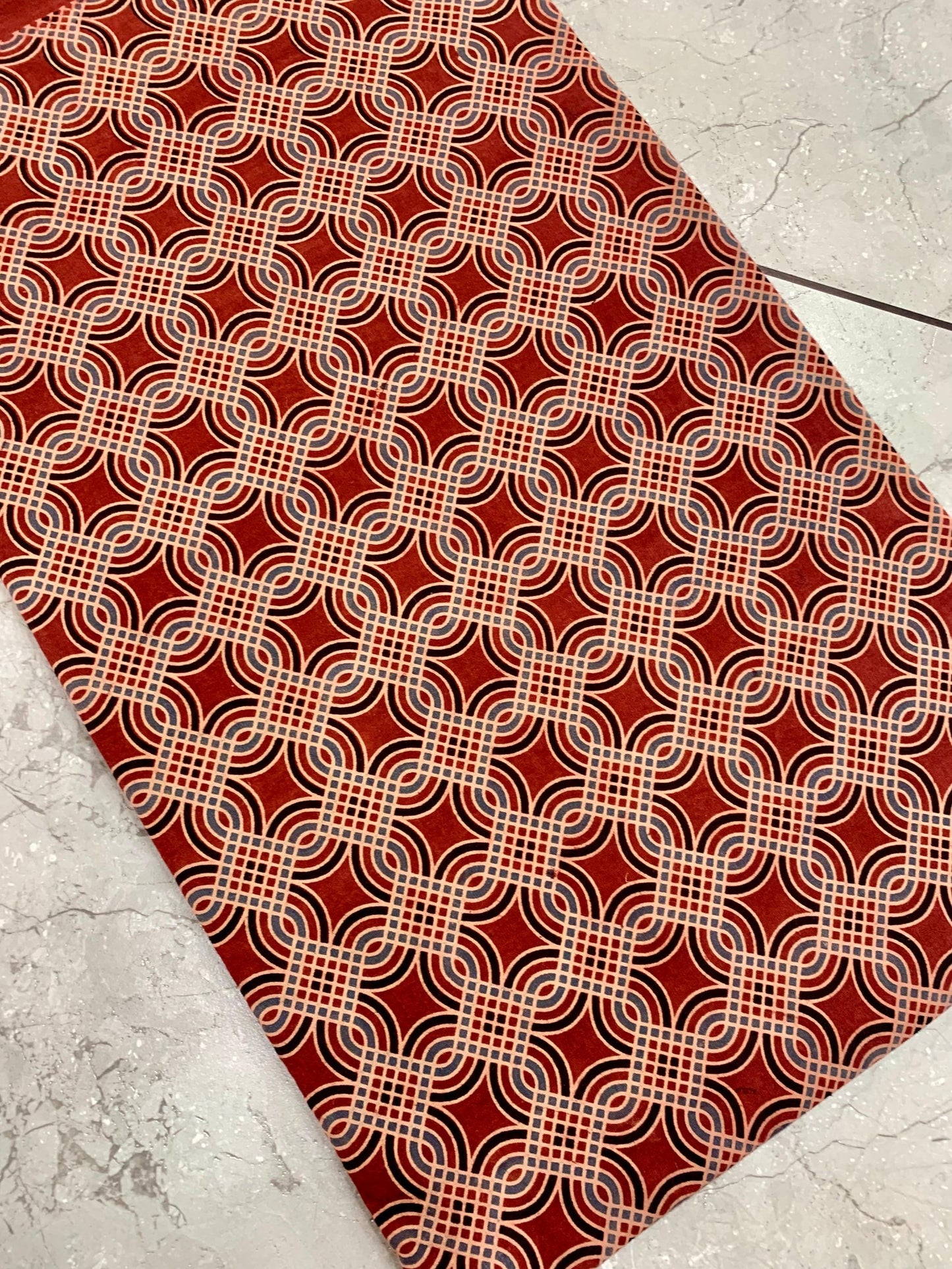 Maroon Ajrakh pure cotton handblock printed wholesale fabric featuring classic Rajasthan motifs by Fabtexs.