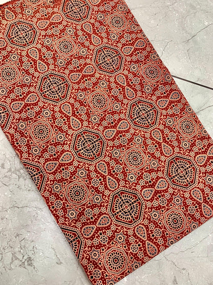 Maroon Ajrakh handblock printed pure cotton wholesale fabric with combined jaal and motif detailing by Fabtexs.