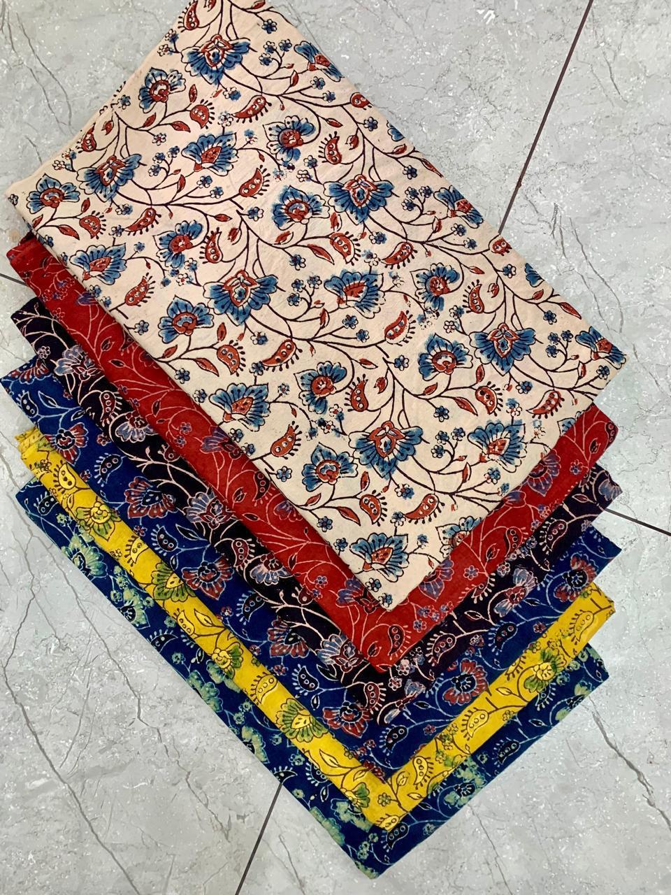 Cream-based multi-motif Ajrakh pure cotton fabric, handcrafted using natural dyes for Fabtexs wholesale buyers.