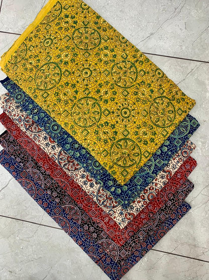 Multi-pattern Ajrakh printed pure cotton wholesale fabric featuring classic handcrafted Rajasthan designs by Fabtexs.