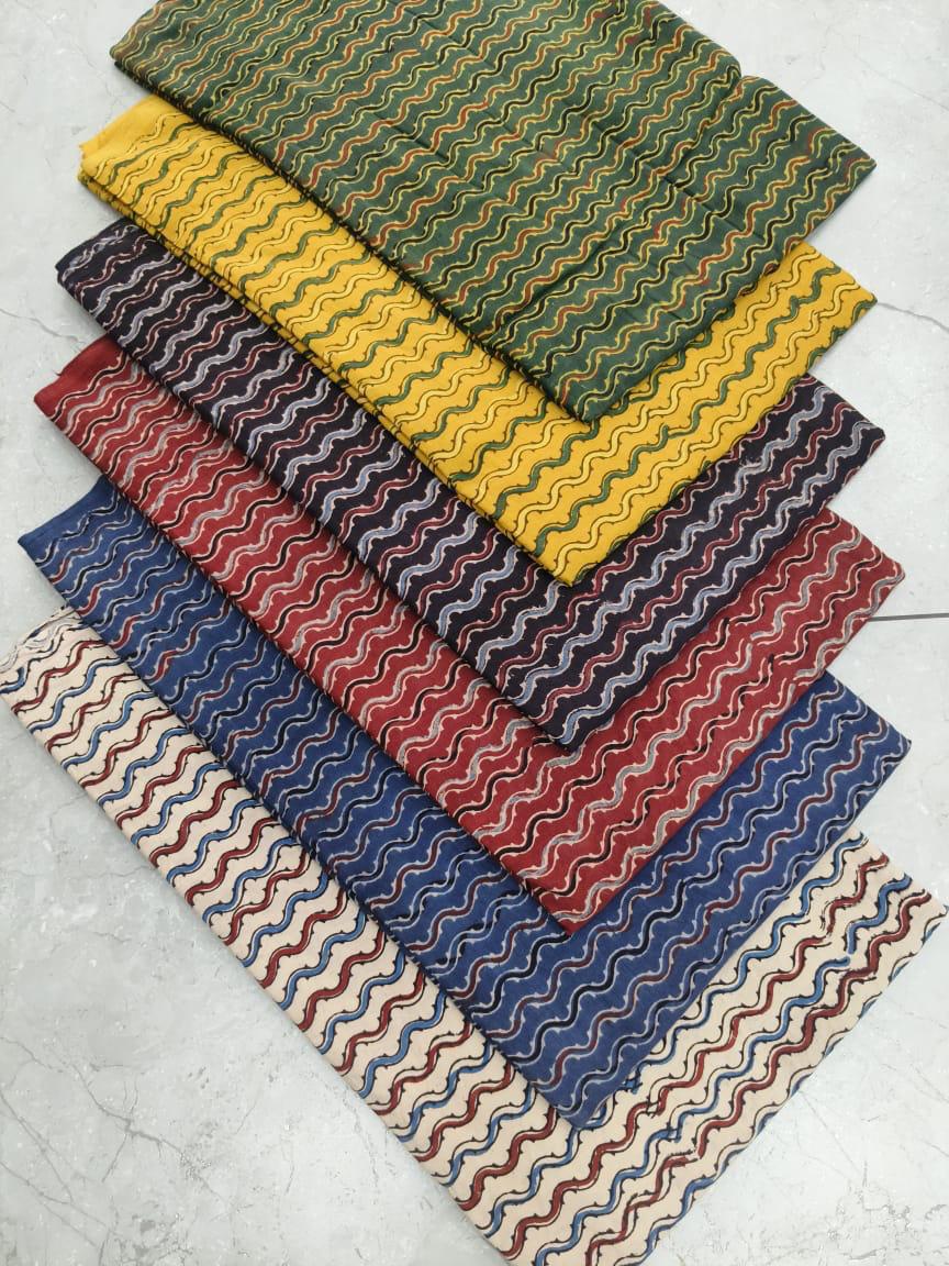 Wave-pattern multi-color Ajrakh handblock printed cotton fabric wholesale, handcrafted by Fabtexs.