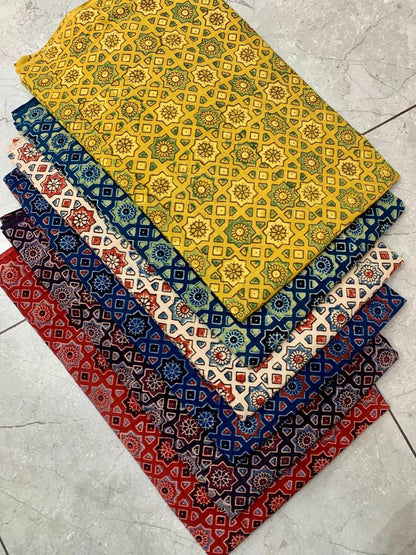 Mustard Ajrakh handblock printed pure cotton fabric wholesale—traditional motifs with natural dye detailing by Fabtexs.