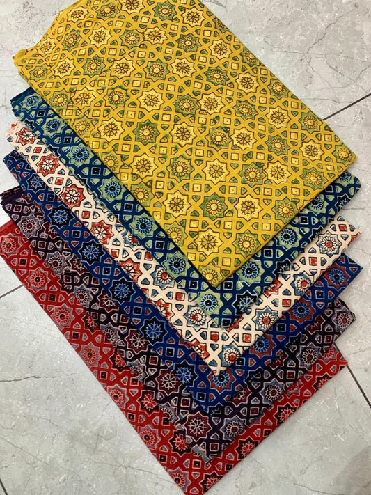 Mustard Ajrakh handblock printed pure cotton fabric wholesale—traditional motifs with natural dye detailing by Fabtexs.