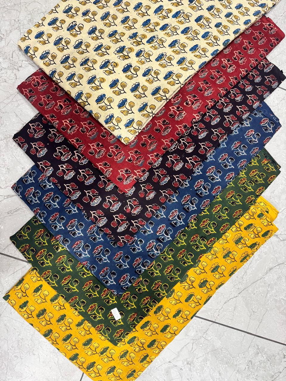 Yellow traditional Ajrakh handblock printed pure cotton fabric, artisan-made for bulk orders from Fabtexs.