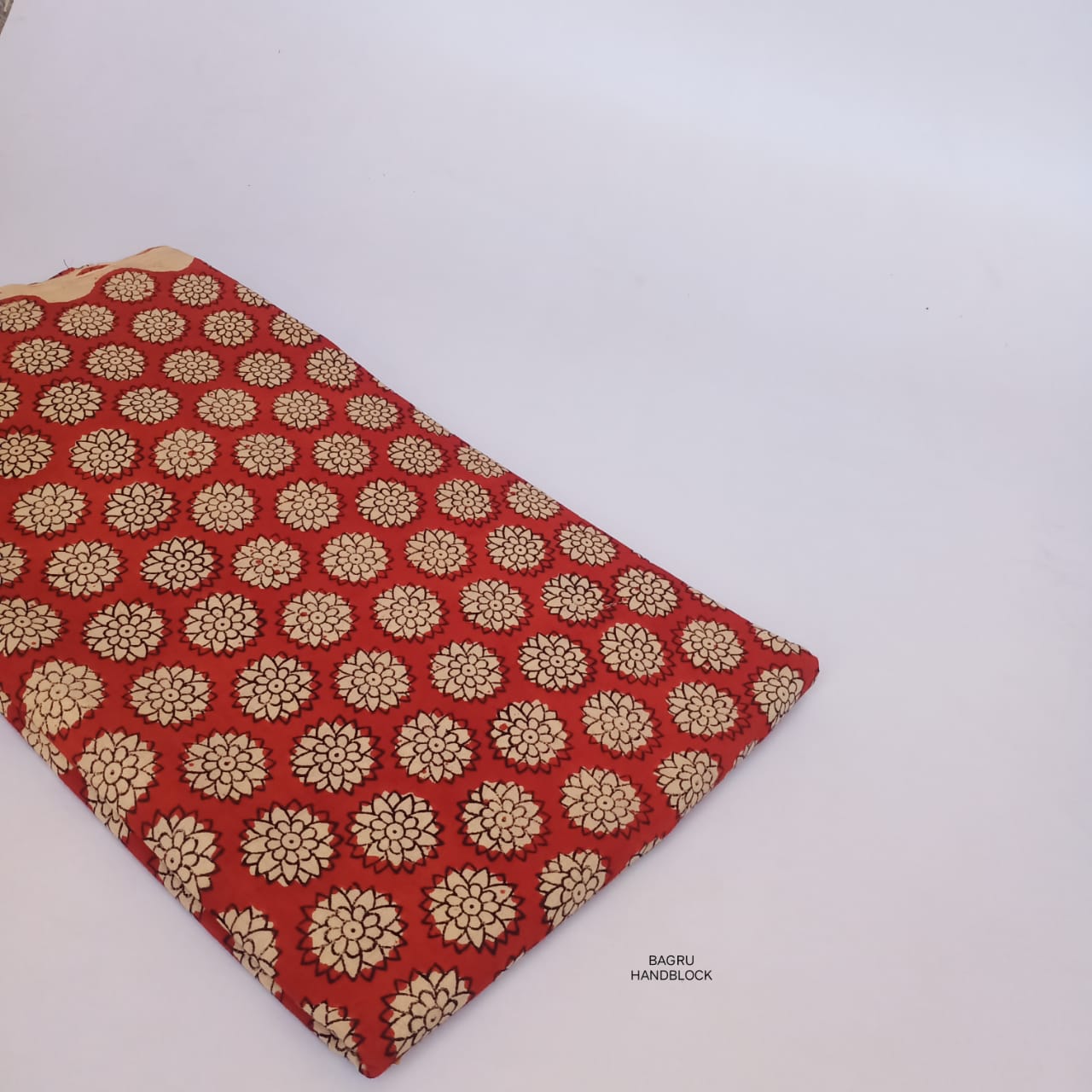 Madder red pure cotton Bagru handblock print fabric, naturally dyed and handcrafted by Rajasthan artisans for wholesale buyers.