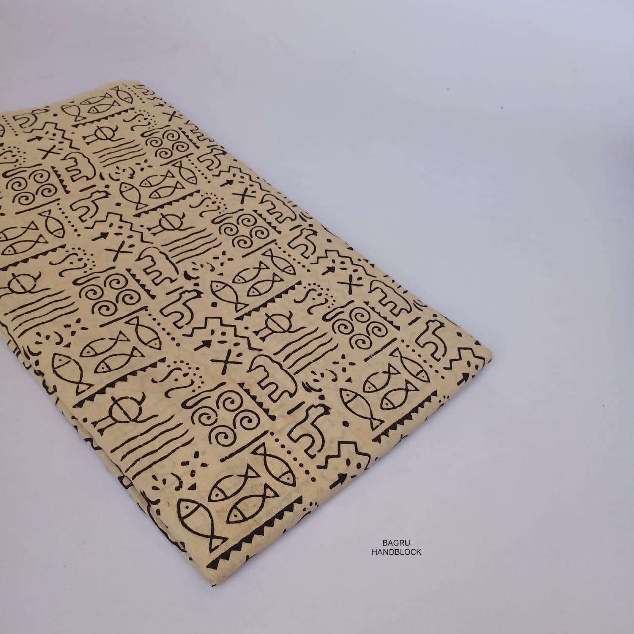 Cream and black fish motif Bagru handblock printed cotton fabric wholesale