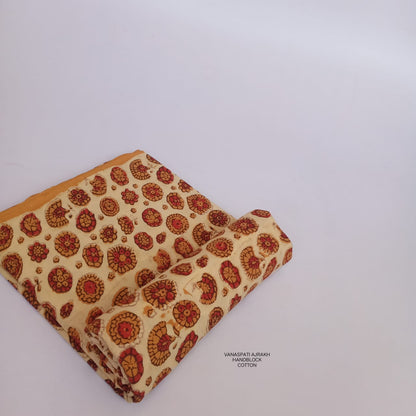 Floral Vanaspati print on cream Bagru handblock pure cotton fabric, handcrafted and sustainably dyed for Fabtexs wholesale orders.