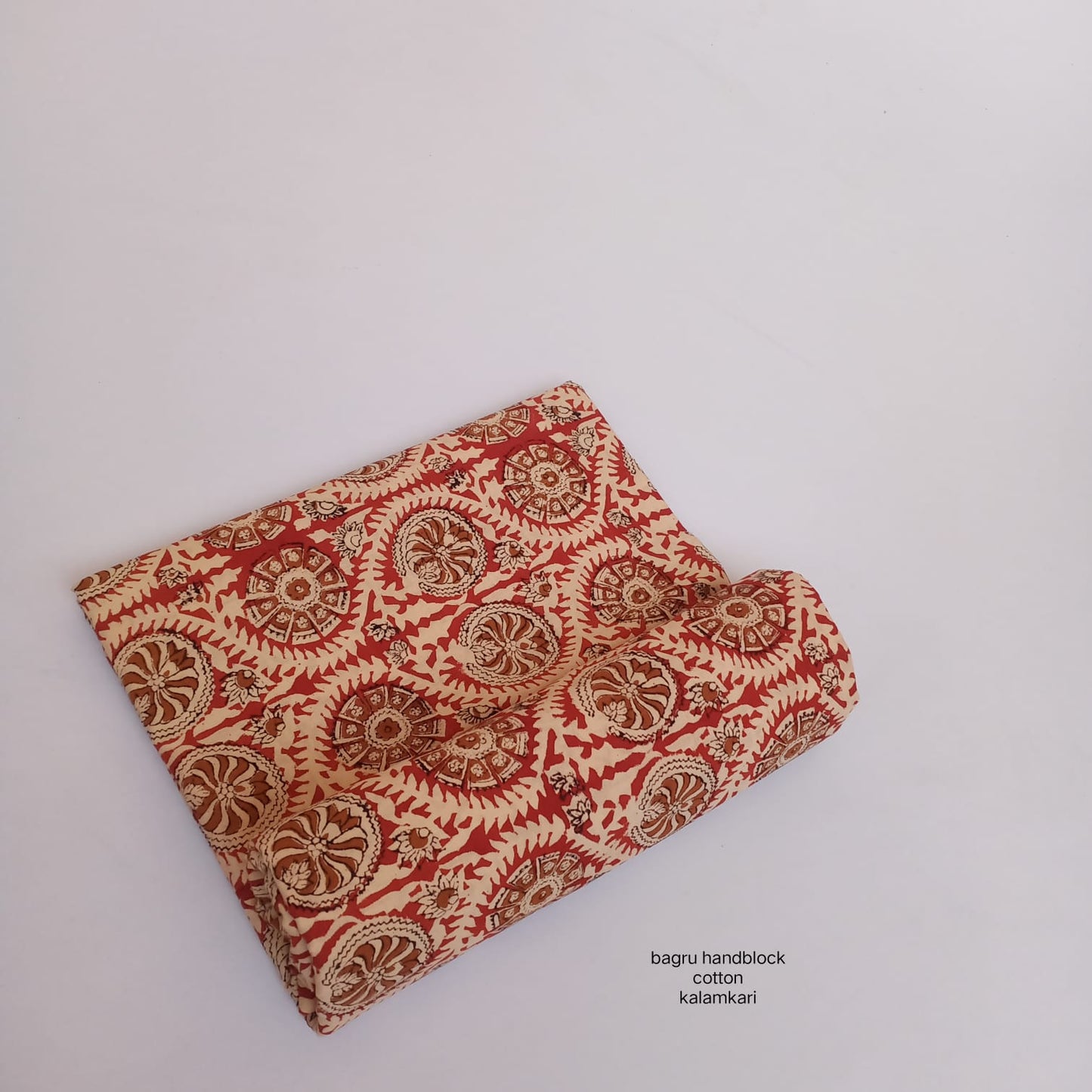 Madder red circular floral Bagru handblock printed cotton fabric for wholesale buyers