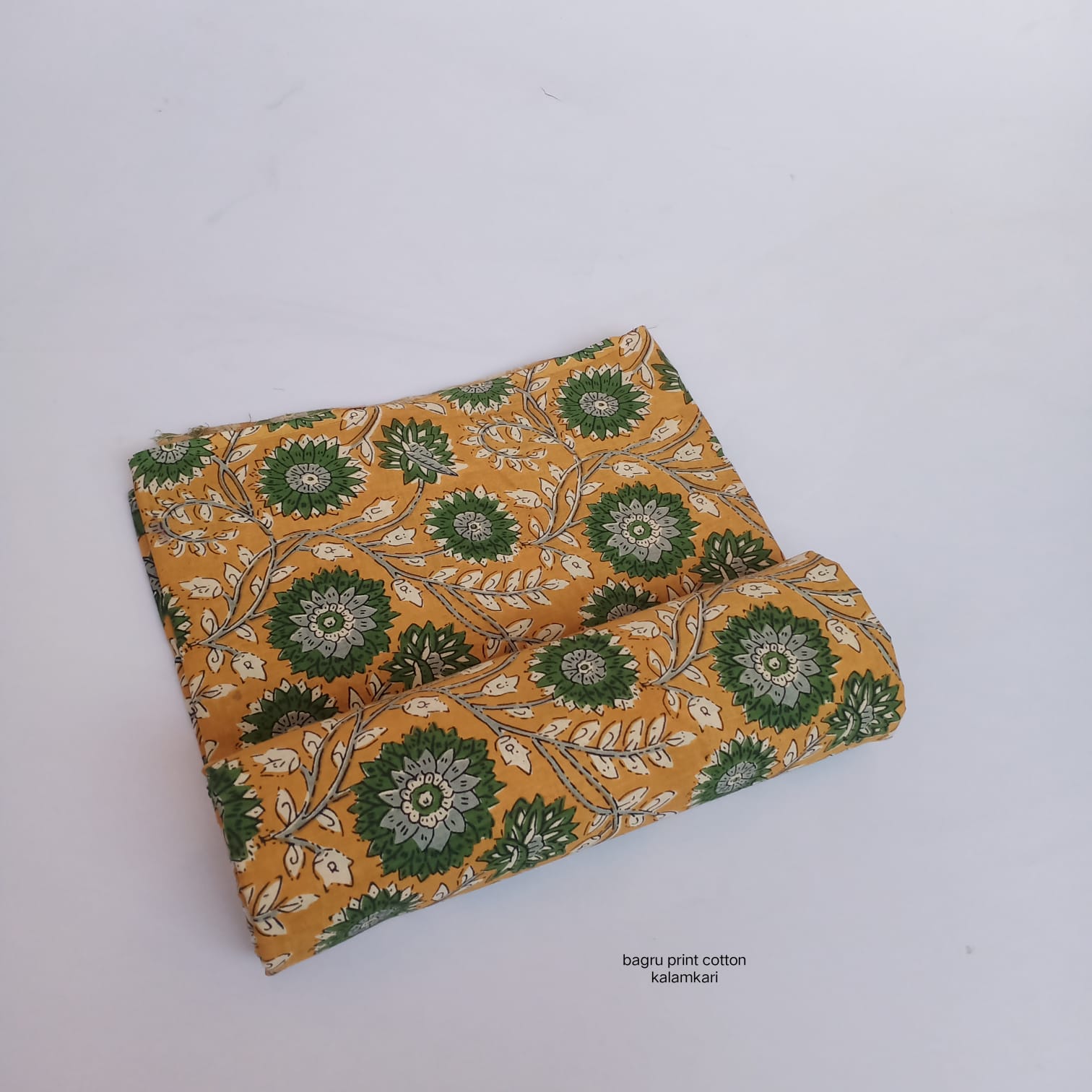 Mustard green Bagru handblock printed cotton fabric with floral jaal pattern, sustainable wholesale textile by Fabtexs