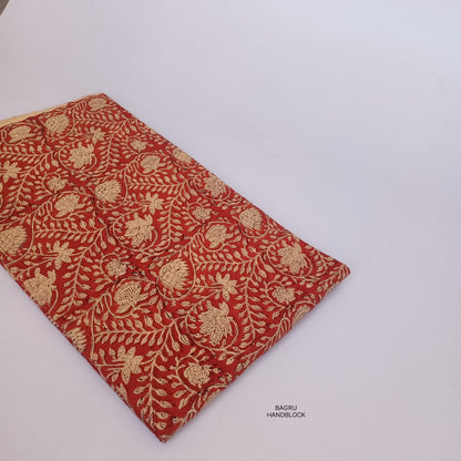 Rich rust jaal Bagru handblock printed fabric, pure cotton base, slow-made by artisans for designer collections.