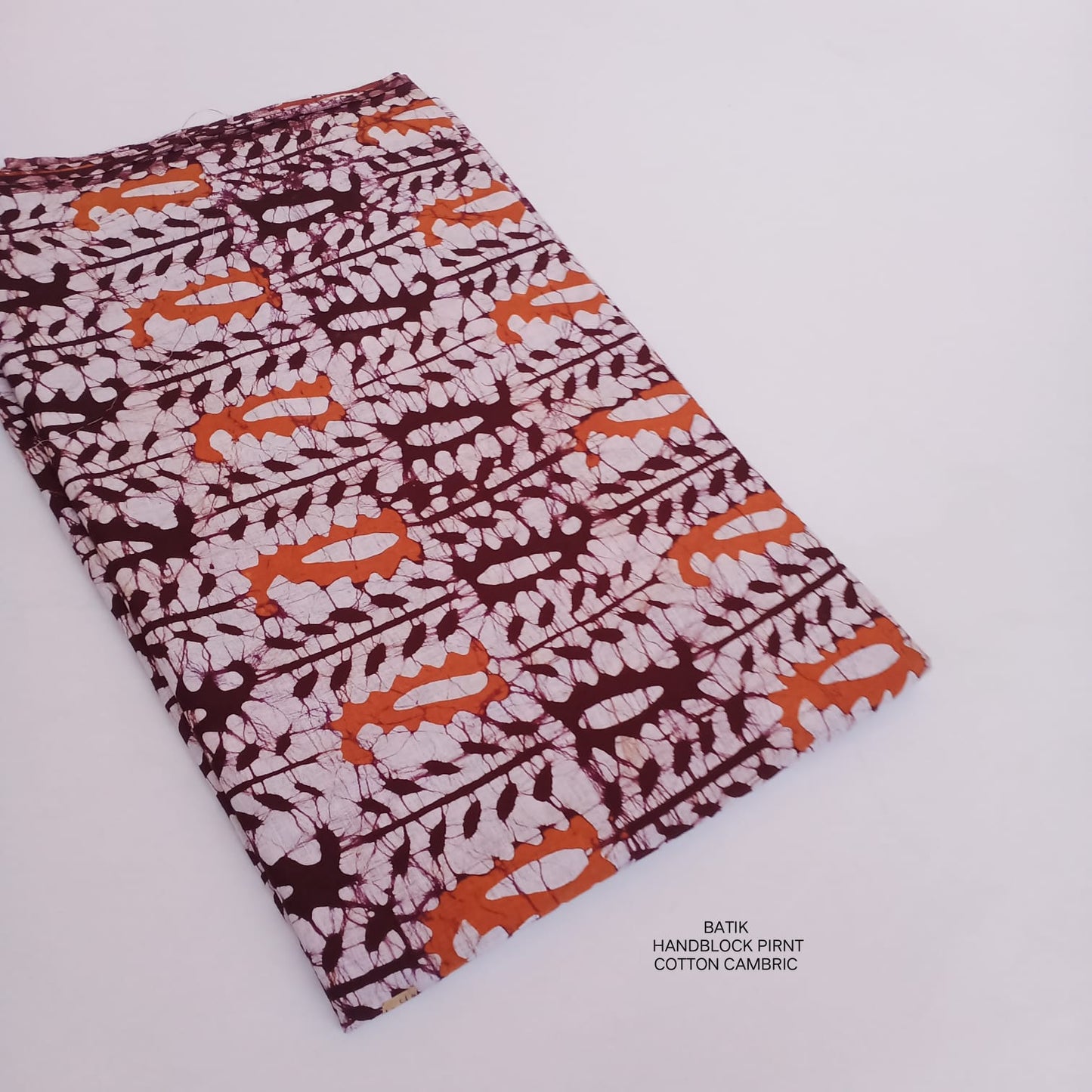 Pure cotton batik fabric wholesale in maroon paisley, handcrafted batik print fabric for boutique, designer & bulk buyers – Fabtexs