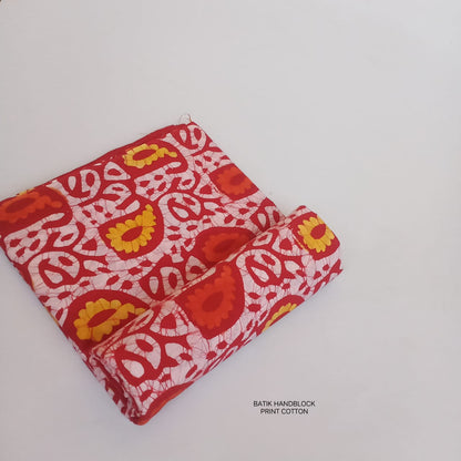 Pure cotton batik fabric wholesale in orange, handcrafted batik print fabric for boutique, designer & bulk buyers – Fabtexs