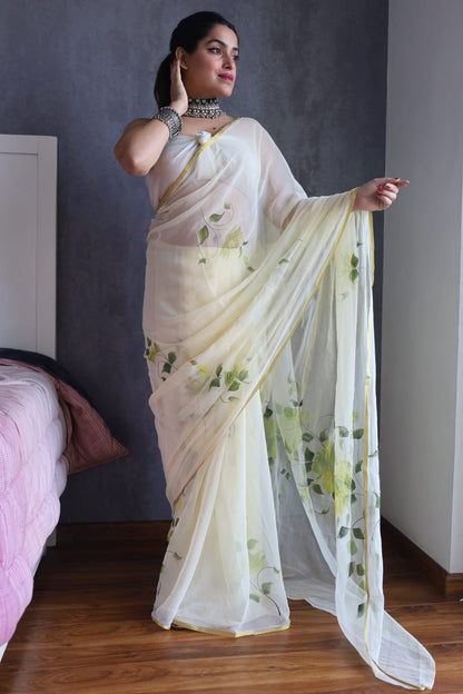 Off-White Chiffon Zari Border Handpainted Saree with Leaf Design – Wholesale Saree Manufacturer