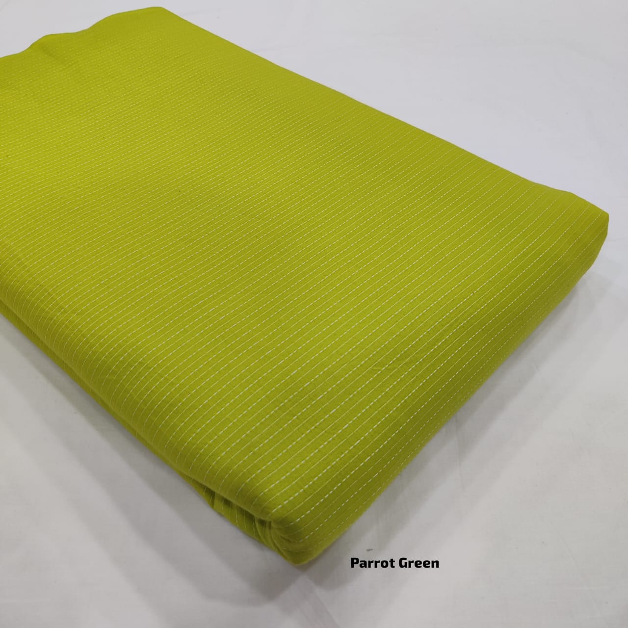 Lime green pure cotton Kantha fabric with layered surface texture, wholesale fabric from Fabtexs