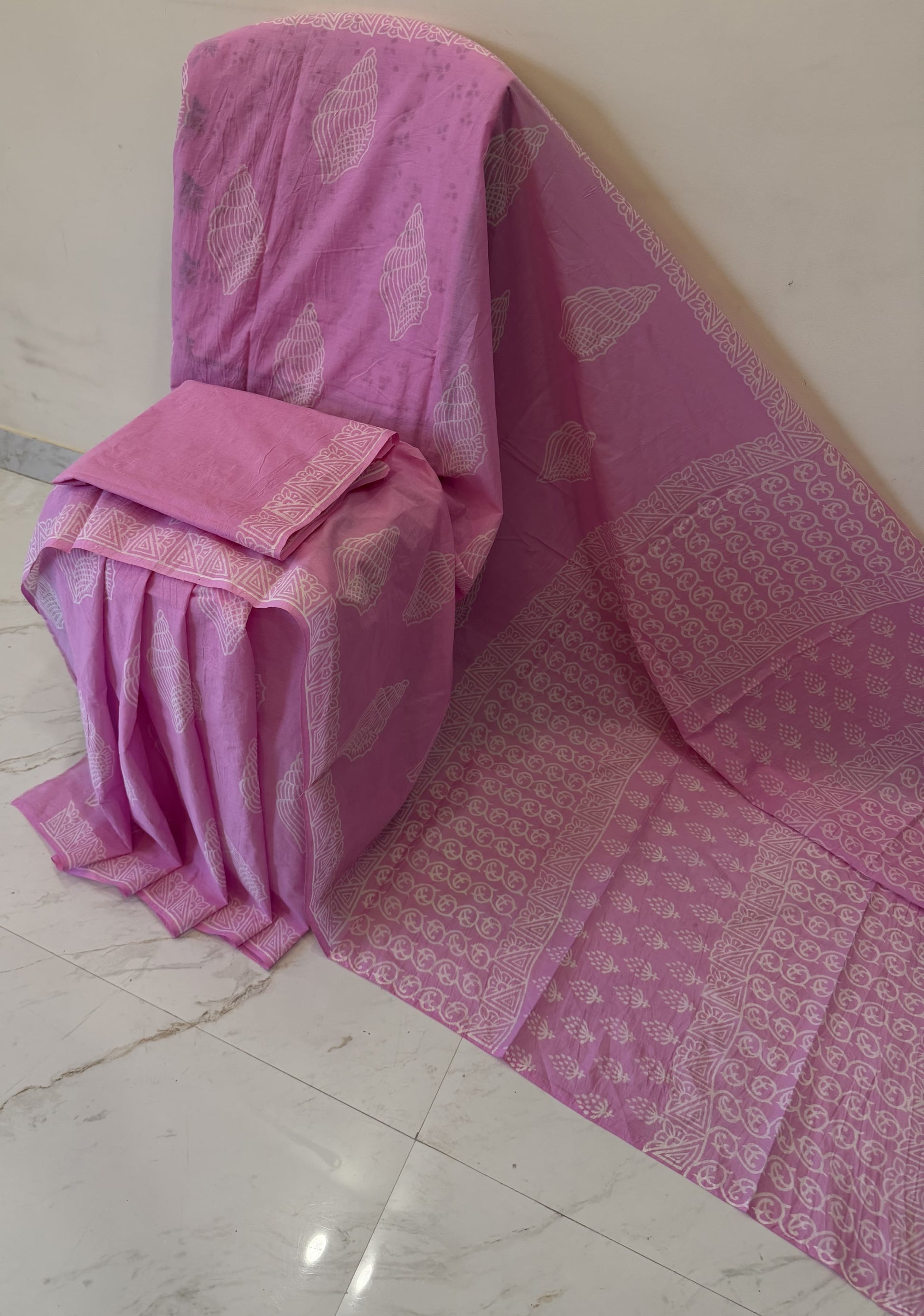 Cotton mulmul handblock printed saree wholesale in light pink Ajrakh pattern
