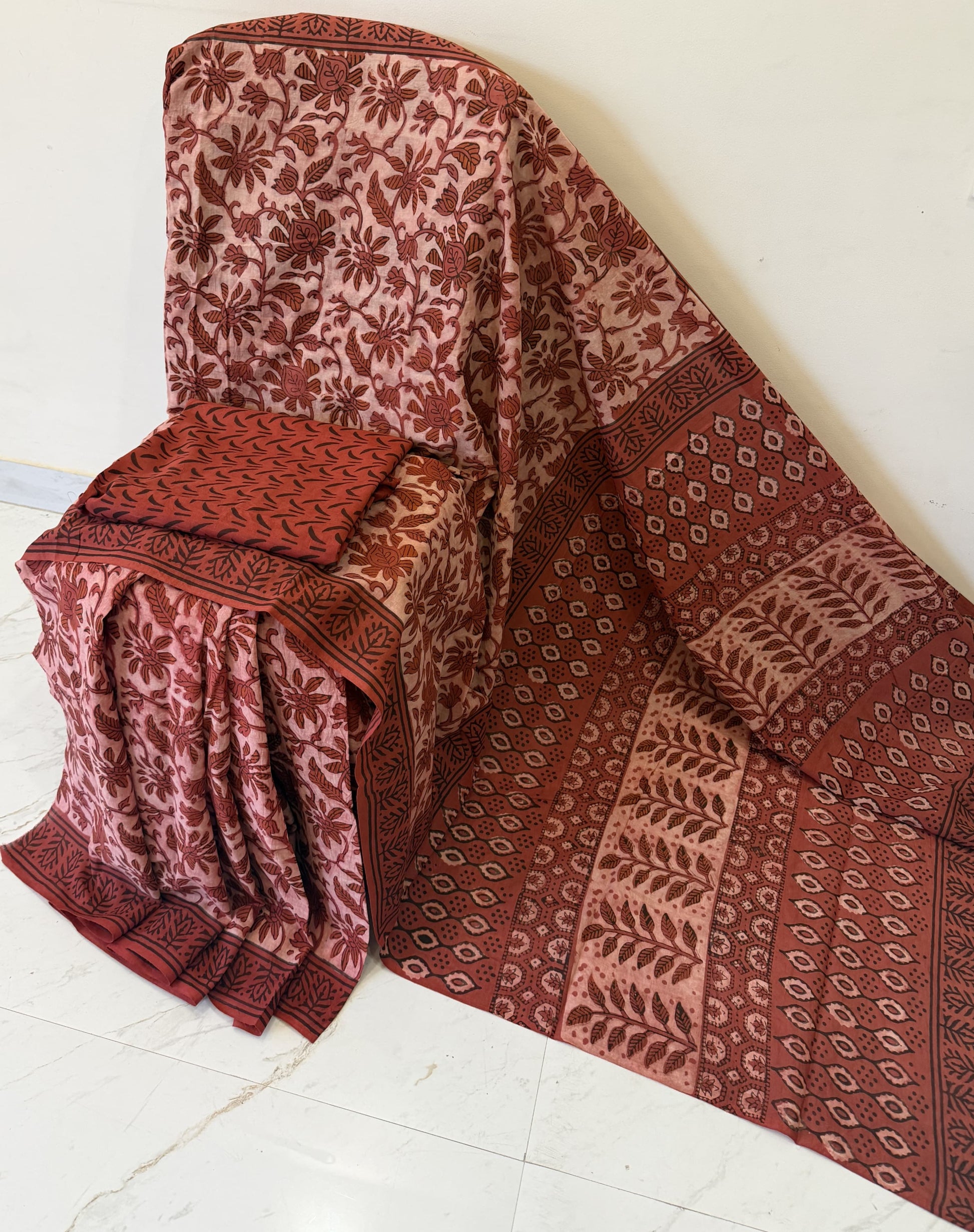 Cotton mulmul handblock printed saree wholesale in rust Ajrakh pattern