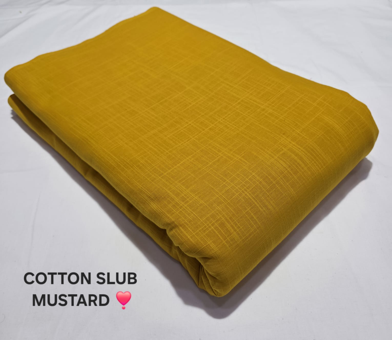 Mustard yellow pure cotton slub fabric, durable weave and rich tone for wholesale buyers