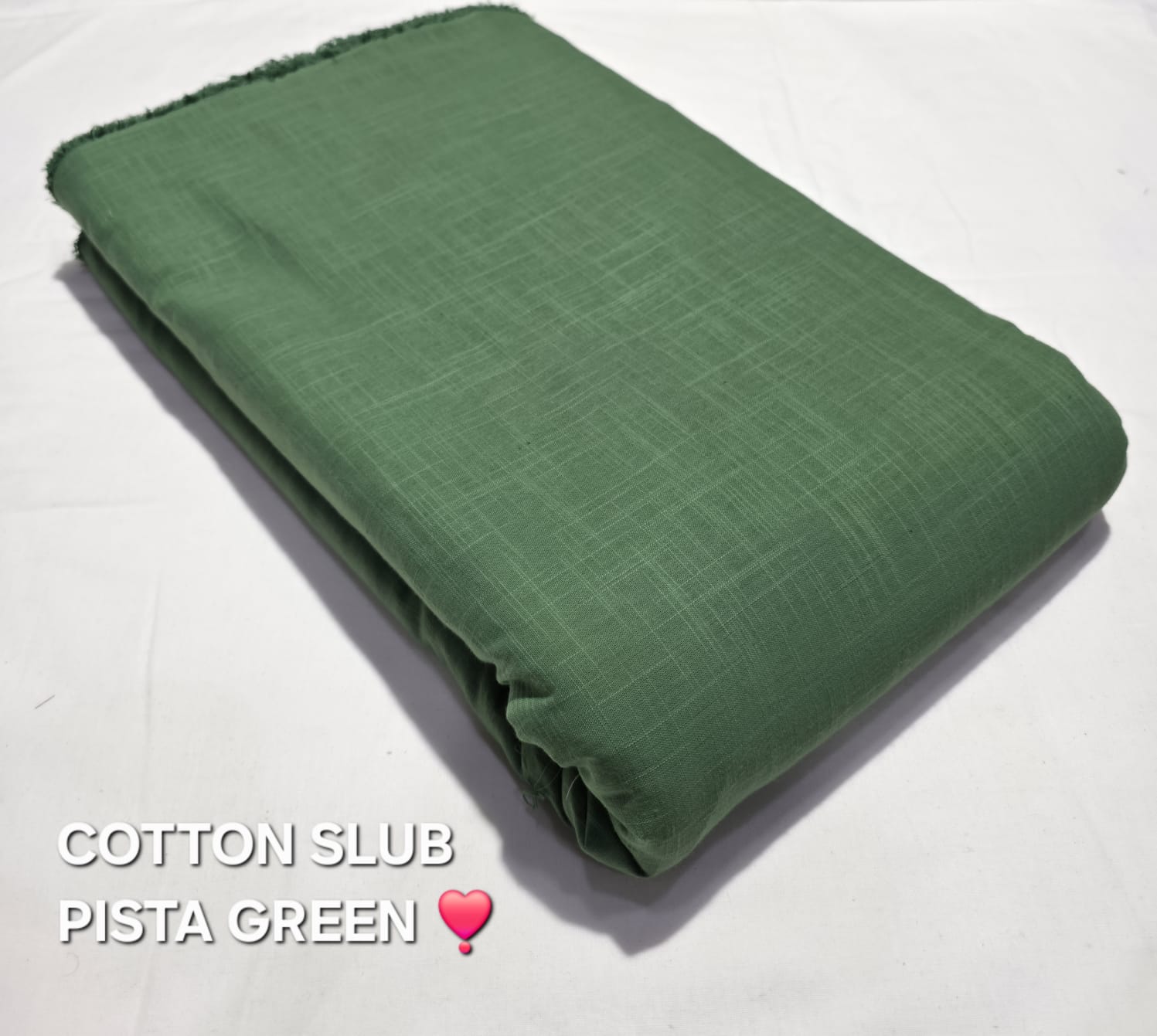 Pista green cotton slub fabric, breathable pure cotton textile for wholesale orders at Fabtexs