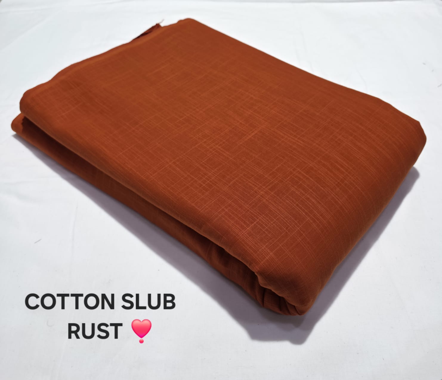 Rust shade cotton slub fabric wholesale, colorfast pure cotton with natural slub texture