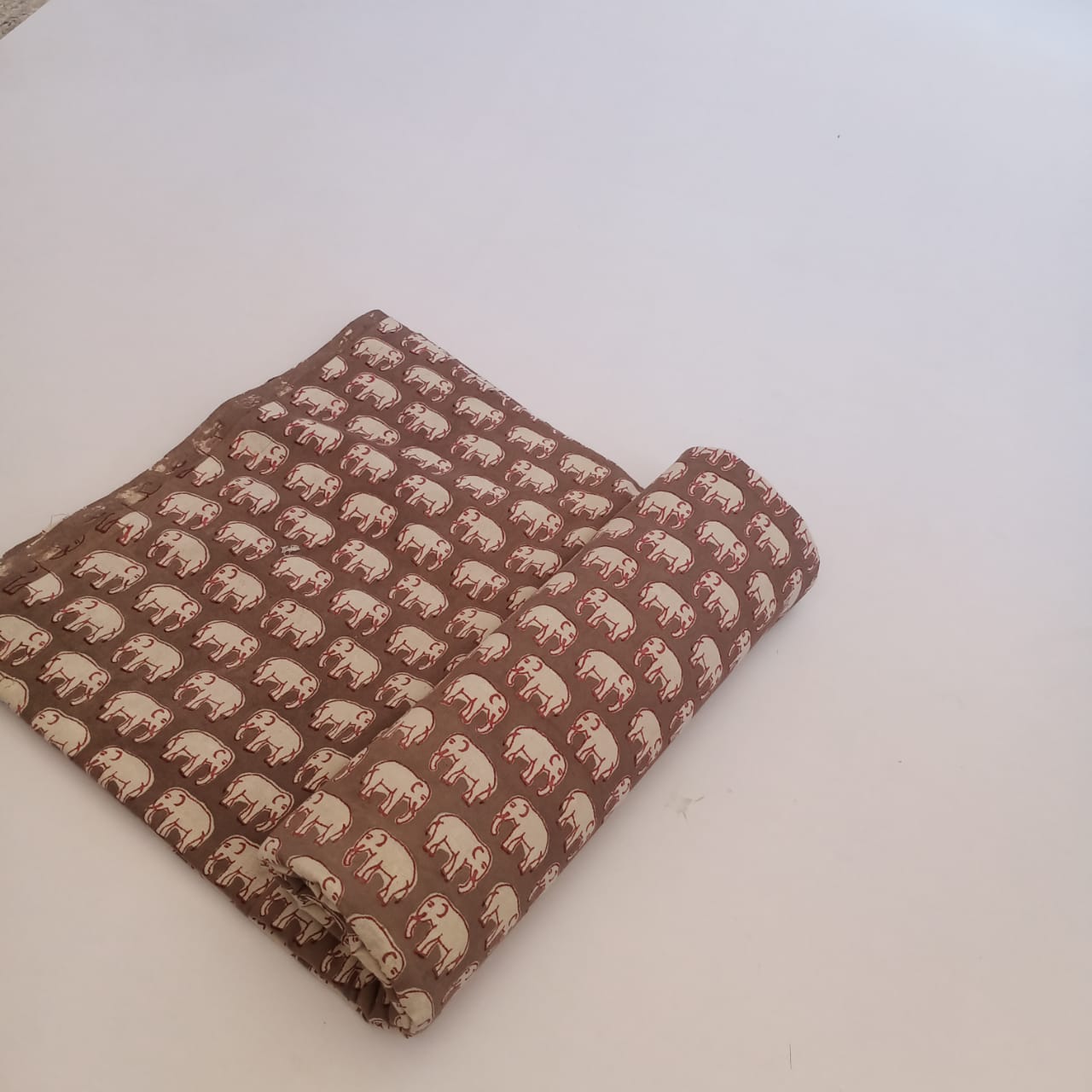 Brown elephant motif Dabu handblock cotton fabric, pure cotton animal print for wholesale sourcing