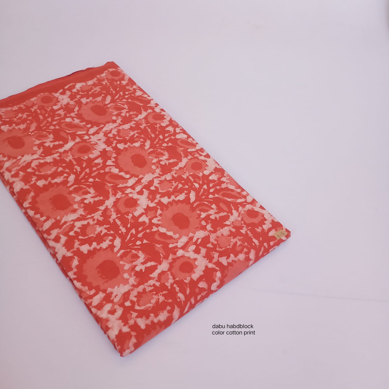 Coral orange floral jaal batik style Dabu handblock cotton fabric