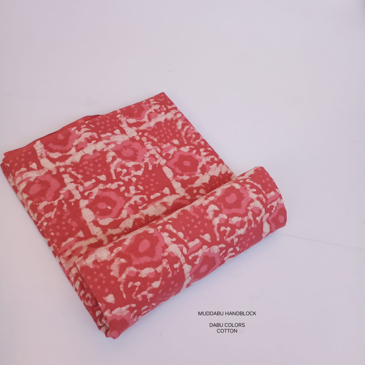 Coral orange floral jaal Dabu handblock cotton fabric artisan crafted