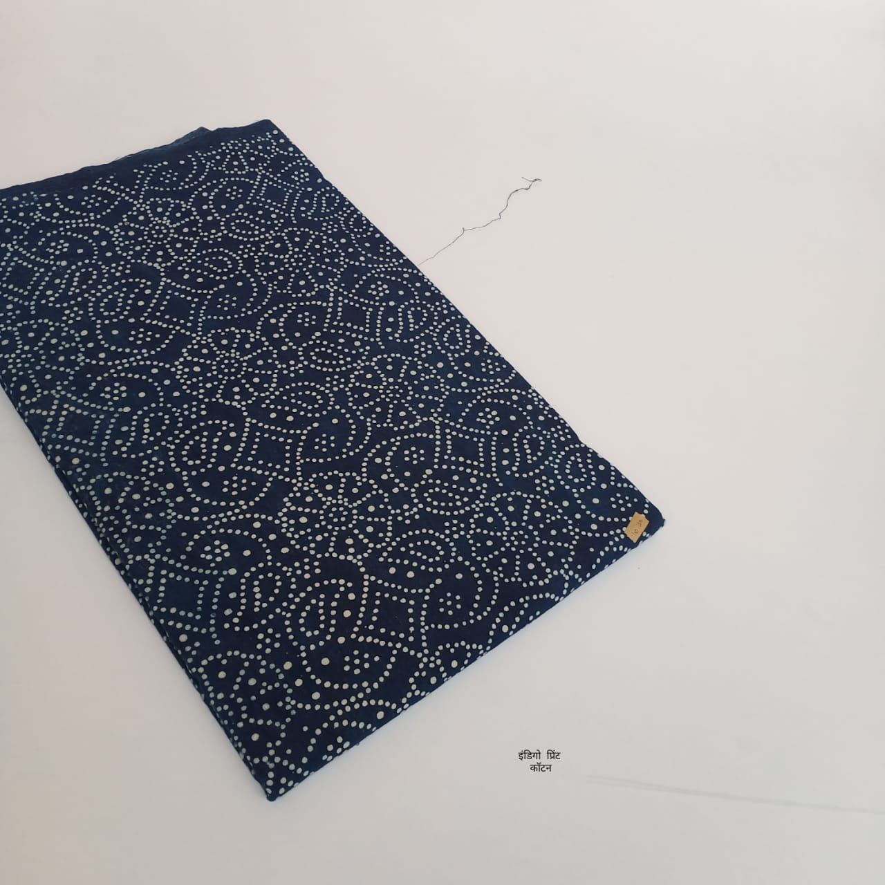 Indigo floral dotted jaal dabu handblock cotton fabric, intricate dotted floral network pattern