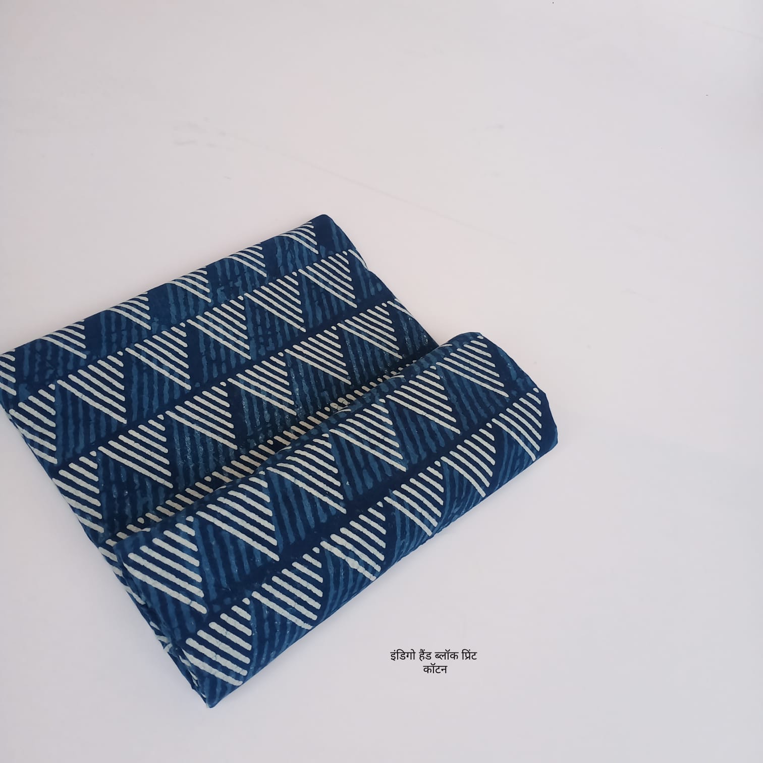 Indigo geometrical triangle dabu handblock cotton fabric, bold geometric artisan design