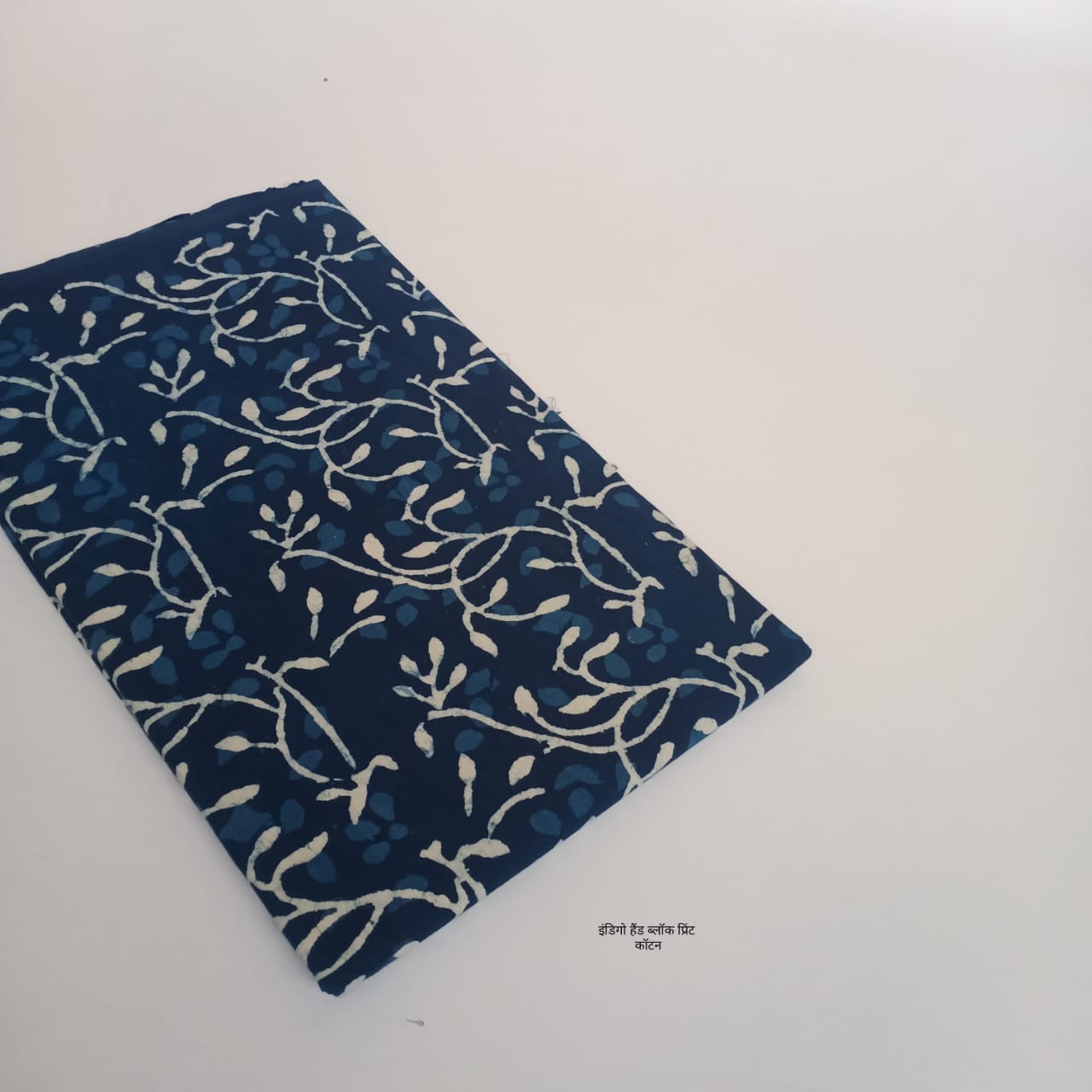 Indigo jaal leaf dabu handblock printed pure cotton fabric, nature-inspired traditional motif