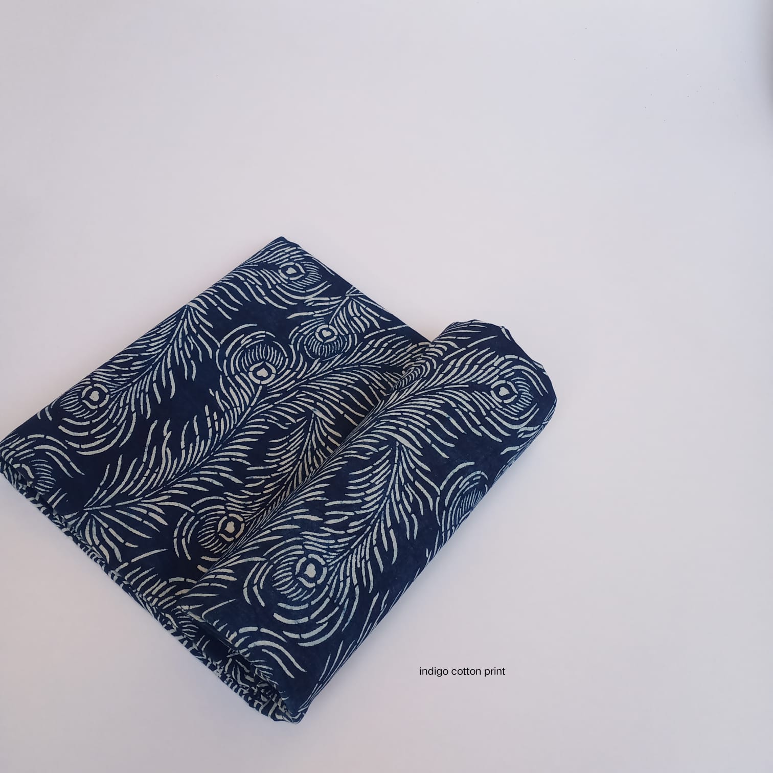 Indigo peacock feather dabu handblock cotton fabric, elegant artisan motif on pure cotton base