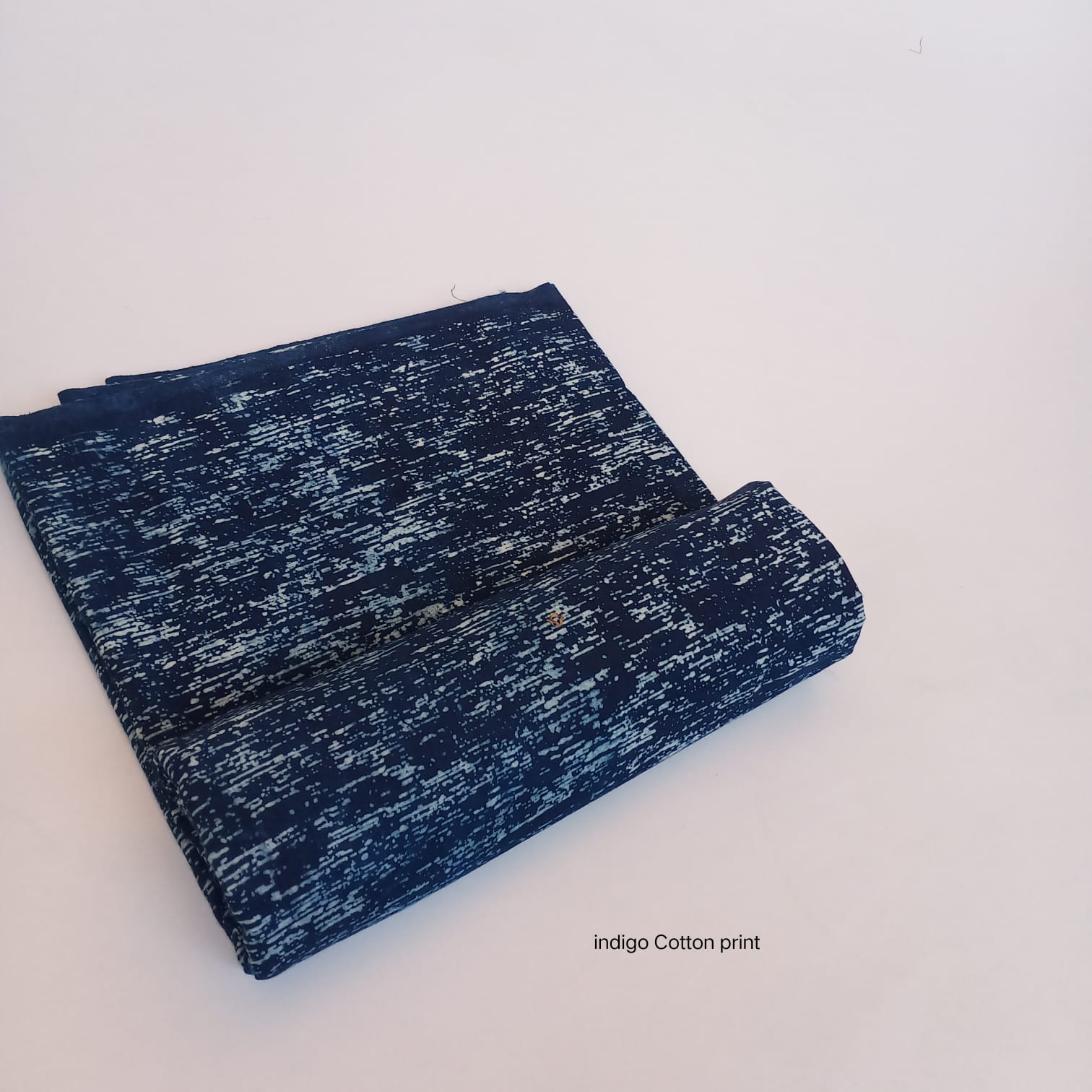 Indigo textured dabu handblock printed pure cotton fabric, subtle artisan surface pattern for wholesale use