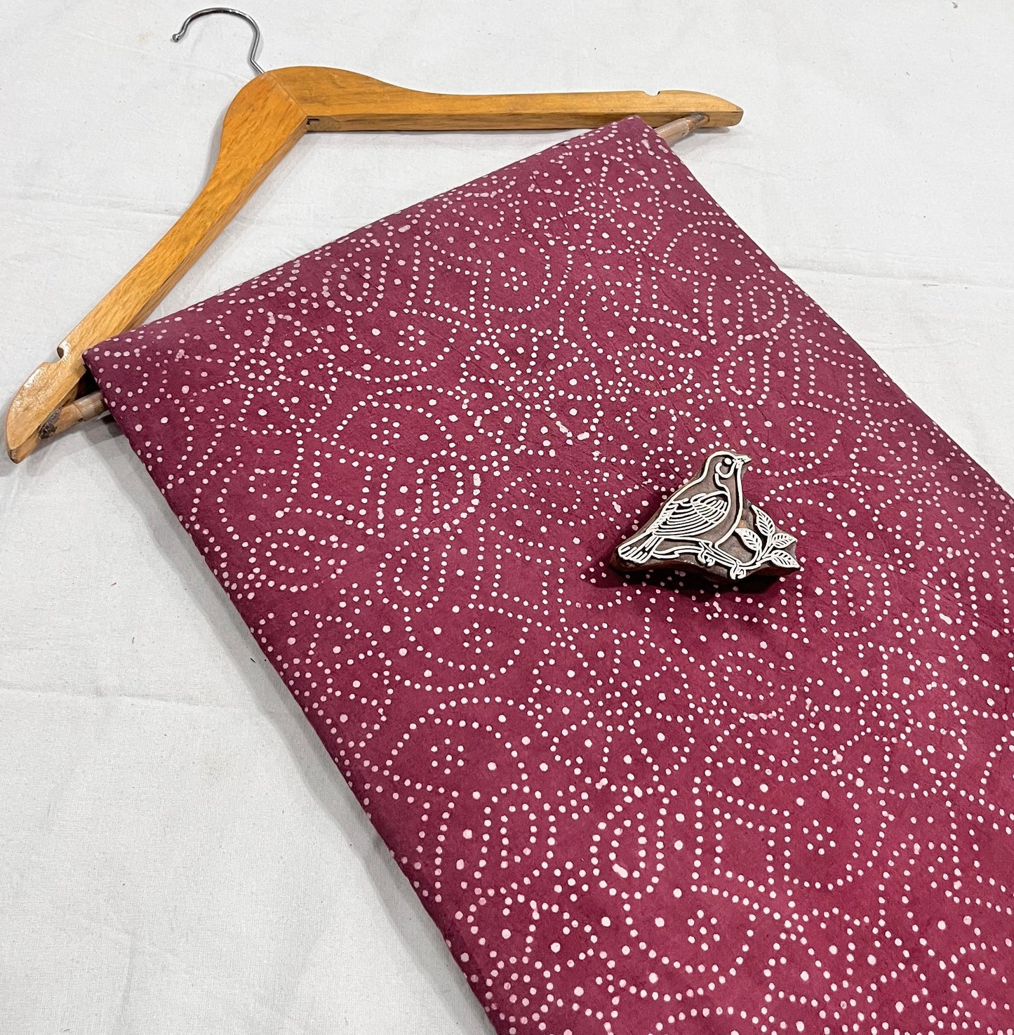 Red dana-pattern pure cotton Dabu block printed fabric, crafted with natural dyes for Fabtex wholesale textile buyers.