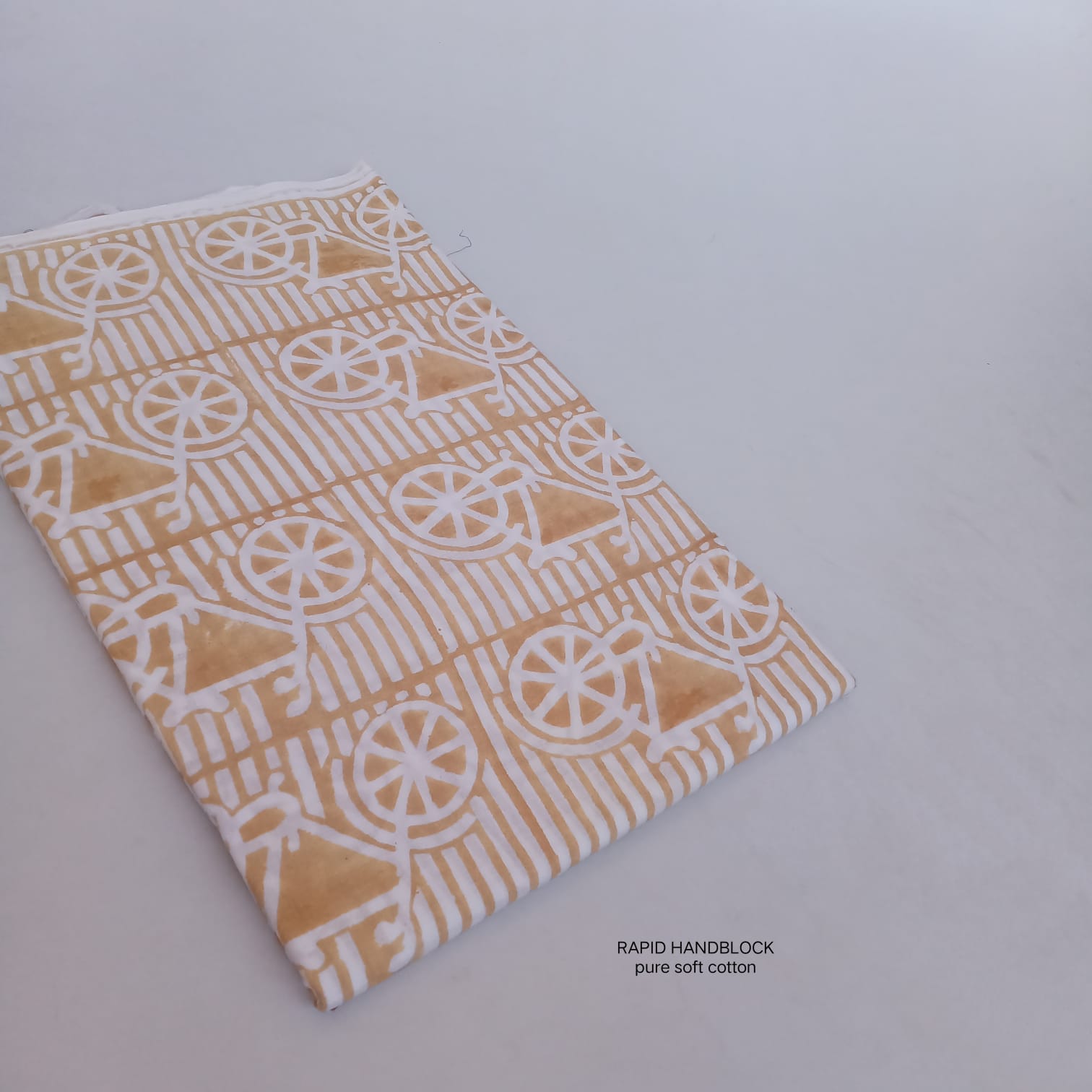 Mustard cycle print pure cotton Sanganeri handblock printed fabric wholesale by Fabtexs